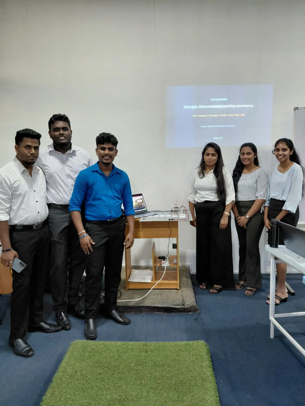 SPM ECO team presenting their smart parking prototype at SLTC